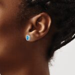 10k White Gold Oval Blue Topaz Post Earrings - Image 3